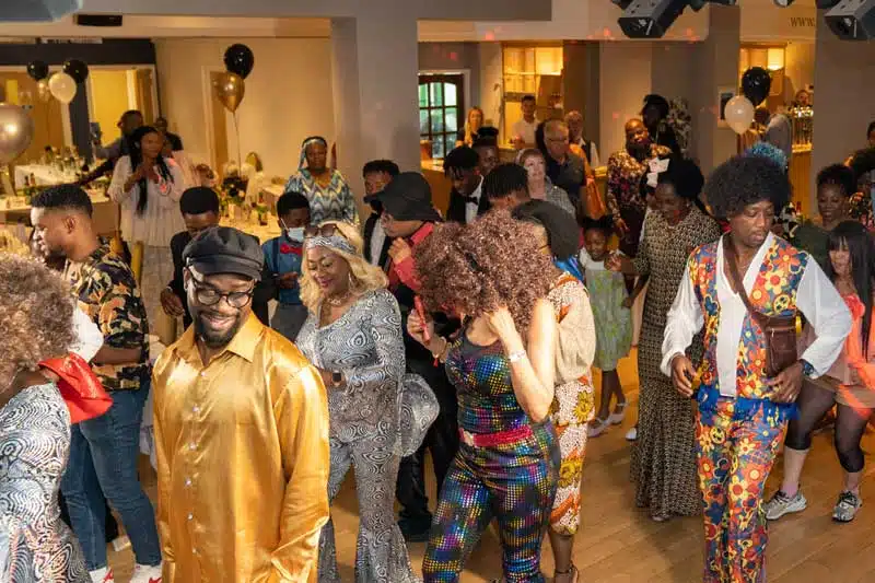 Seventies themed photo booth at a milestone birthday party