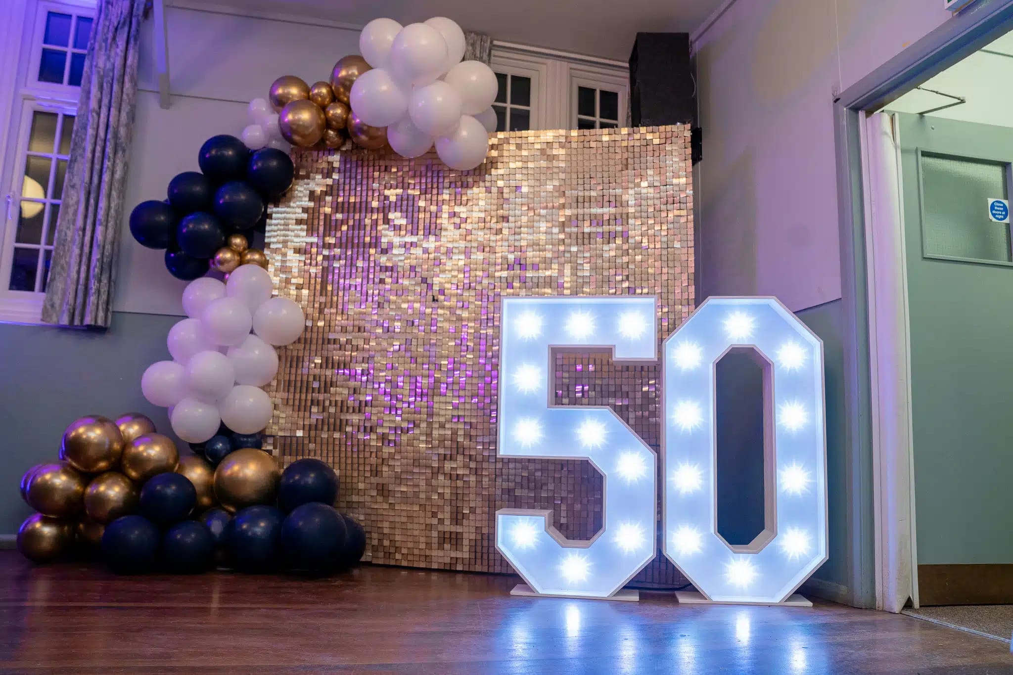 Gold sequin wall backdrop