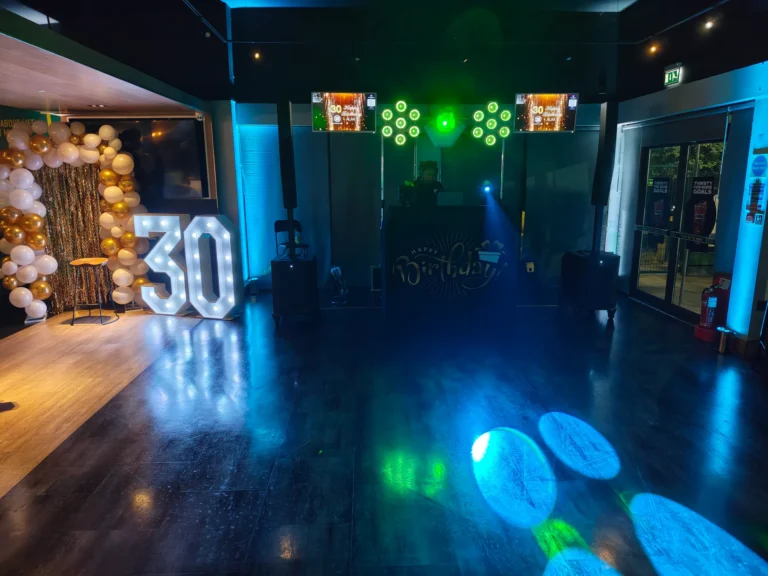 Disctilldawn disco and illuminated 30 numbers at Goals Ruislip with blue and green lighting
