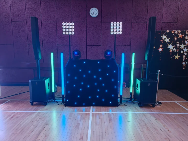 Disctilldawn DJ setup with a black star-lit booth and blue and green lighting at a 40th birthday party at Cuffley Hall, Potters Bar