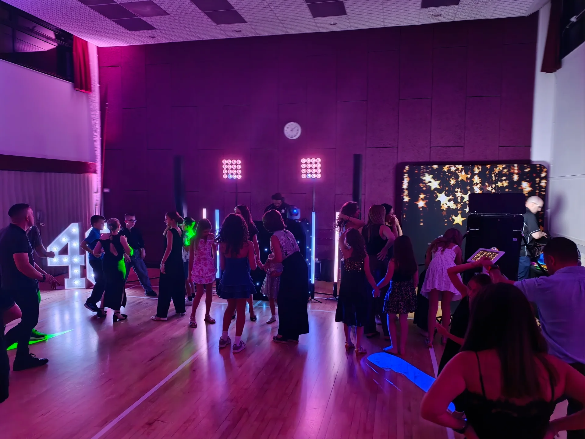 Guests dancing at a 40th birthday party at Cuffley Hall, Potters Bar, with Disctilldawn disco lighting
